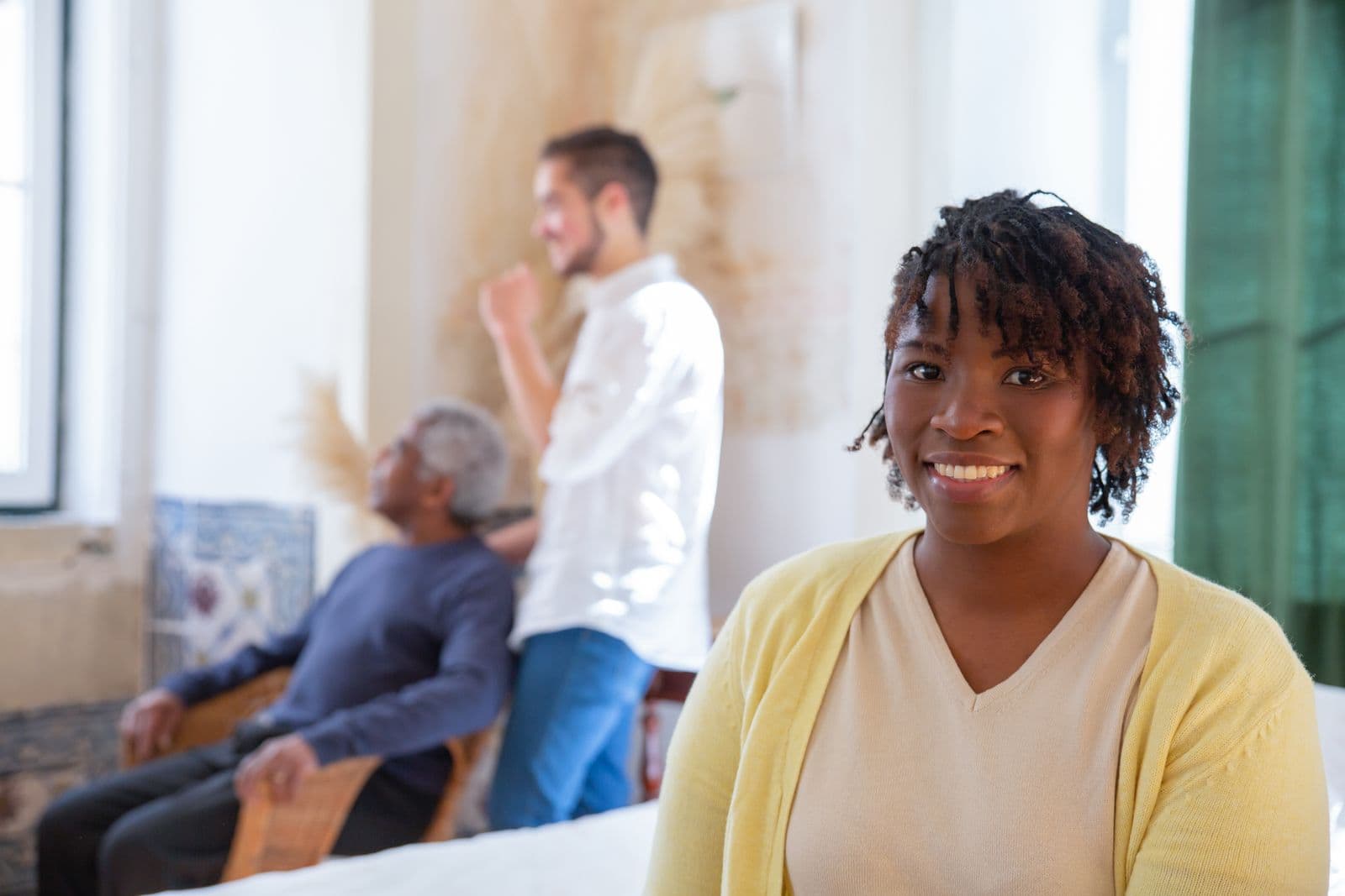 A carer and client sharing a warm moment at home